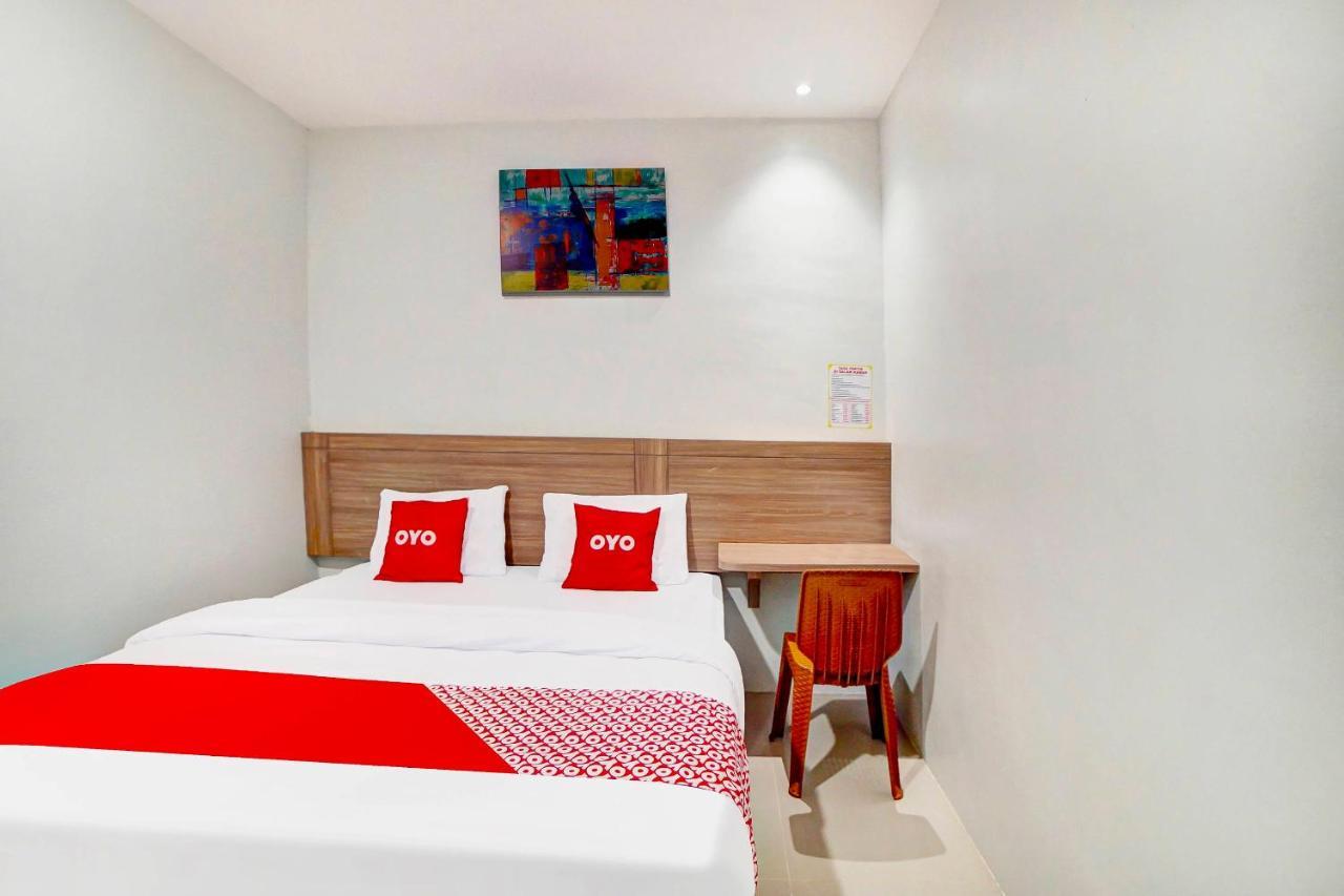 Oyo 91211 Mega Comfort Guest House 棉兰 外观 照片